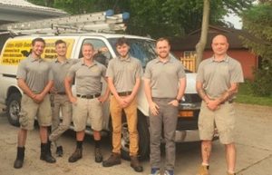 Pictured Here Are 6 Professional Bat Control Experts And Attic Restoration Specialists In Ohio - This humane bat removal company picture was taken in Cleveland, Ohio on May 26, 2021. Shown in the picture (left to right) are Kyle Fortune, Tyler Phillips, Alex Svensen, Nathan Lang, Mike Cottom Jr. and Jason Neitenbach. CRW is a local bat control service (Ohio only) that does not exterminate bats or use live traps to catch bats. Rather, bats are safely removed from homes and buildings in Ohio using multiple bat exclusion processes, devices, funnels, netting and tubes. The 6 men picture know how to get rid of bats in houses. First, they identify all the areas where bats get in. Then they remove unwanted bats from buildings by placing exclusion devices over their main entrance and by sealing all other holes. This means that the roof, eaves and attic are sealed except for primary exits which are outfitted with one-way bat doors (bat valves) which allow bats to exit but prevent re-entry. Costs to hire a bat removal specialist in Ohio start at $239. Bat exclusion costs in Ohio start at $1,495. Bats in Ohio are beneficial because they feed on and help to control many agricultural pests.The exclusion of more than 15 individual bats from a structure in Ohio during the time period of May 16th through July 31st requires written authorization from the Division of Wildlife (DOW) under Ohio Administrative Code (OAC) 1501:31-15-03. To schedule an inspection and a bat exclusion service contact the Cottom's Wildlife Removal company at 440-236-8114 in Cleveland or Northern Ohio, 614-300-2763 in Columbus or Central Ohio or 513-808-9530 in Cincinnati or Southern Ohio. Bat in Ohio are not dangerous and they will not attack you. Bat-strain rabies is present everywhere in Ohio with rabid bats having been identified from nearly all of Ohio's counties over the years.