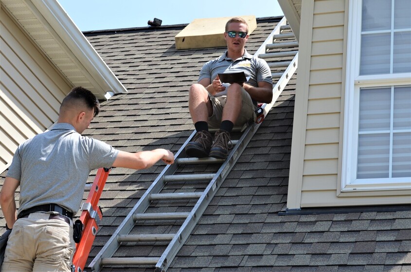 NOVEMBER 2, 2021 - Pictured Here Are Tyler Phillips And Alex Svensen From The Cottom's Wildlife Removal Company Removing And Excluding Bats From A House In Ohio